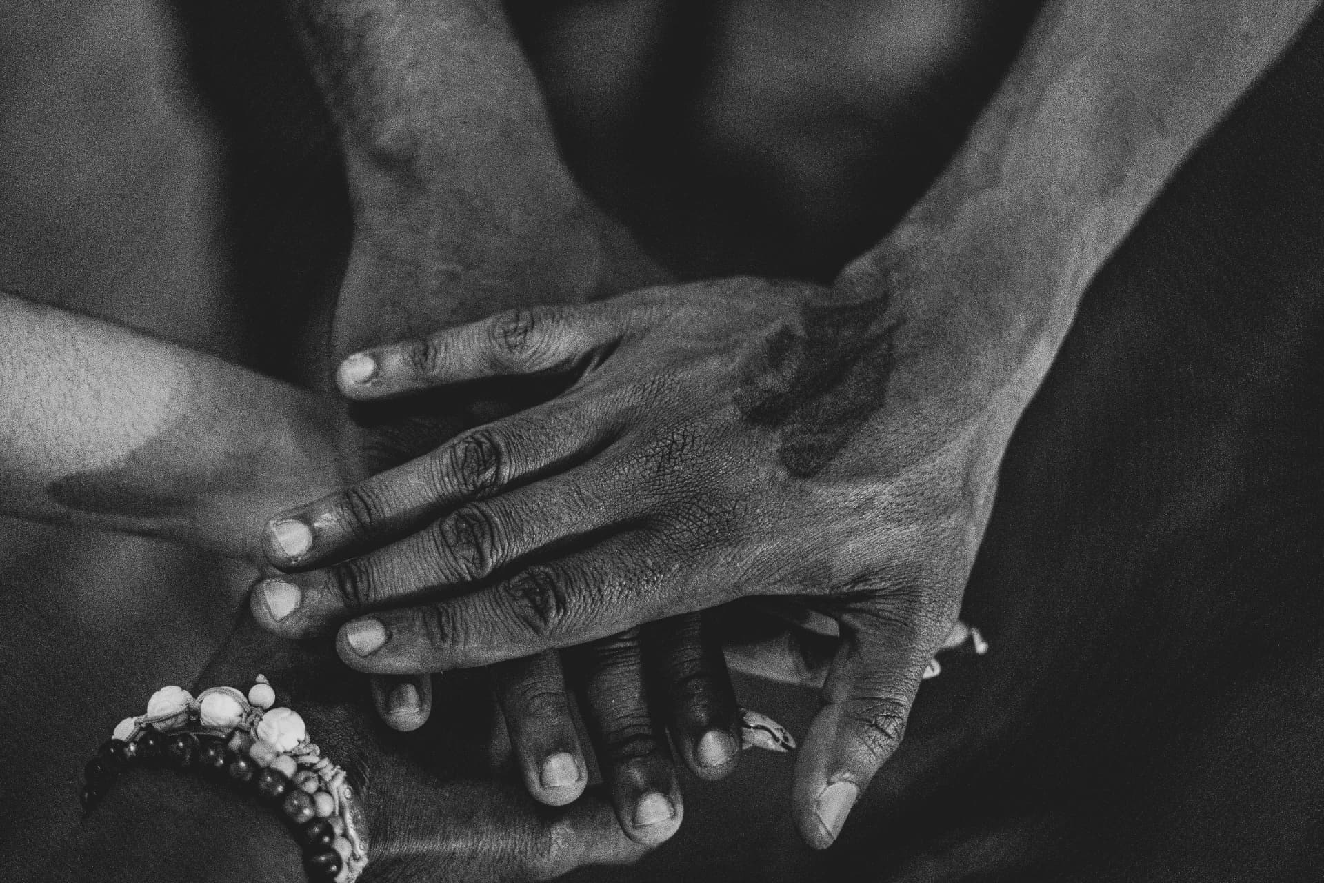 Hands resting on one another